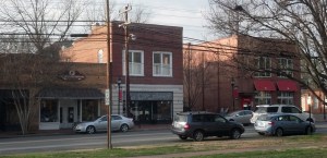 131 N. Main St. housed White-Jetton Drug. Co. (white and brick front).