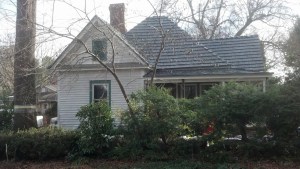 This small cottage on Spring Street was the scene of the shooting. The building apparently once sat about 100 feet east on South Street. (David Boraks/DavidsonNews.net)