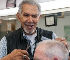 Caption: Ken Norton gave one of his last haircuts Thursday at Raeford’s Barber Shop. (David Boraks/DavidsonNews.net)