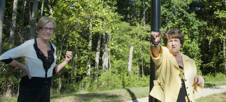The Rev. Mary John Dye, right, pointed out locations of new buildings on Mt. Zion's planned 