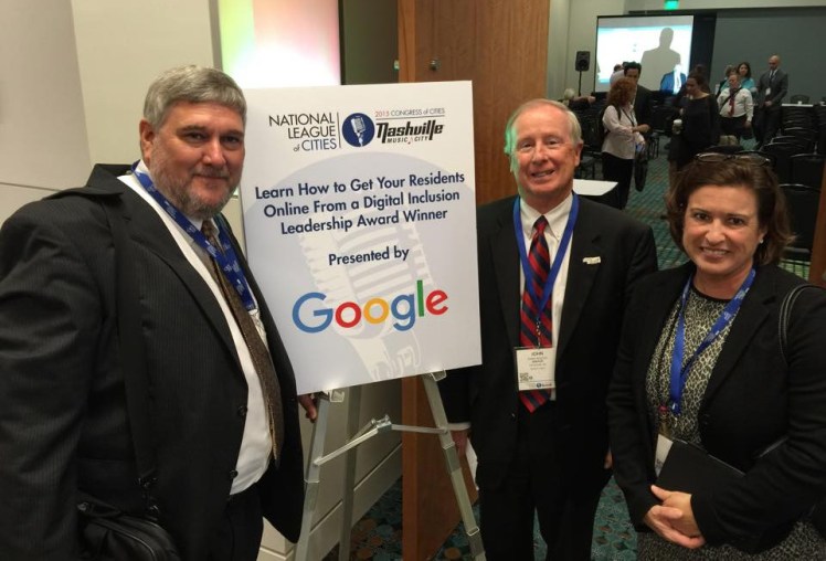 E2D President Pat Millen (left), Davidson Mayor John Woods and E2D board member Lisa Combs accepted the award at the National League of Cities meeting in Nashville Nov. 5. 