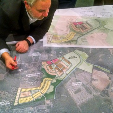 Senior Planner Chad Hall with the Town of Davidson listened to residents' comments about the proposed West Branch project Monday. (David Boraks photo)