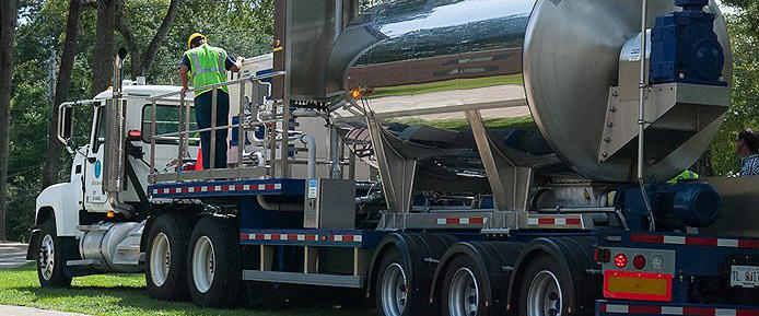 A large truck with an onboard ice maker is used to create the "ice pig." (Utility Services Corp.) 