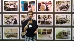 Current publisher Ann Caulkins spoke during Thursday's reception, in front of a wall of old photos. (David Boraks photo)