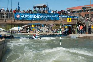 Fans watched a canoe race from above at the Olympic Trials at the whitewater center in Charlotte (David Boraks/WFAE)