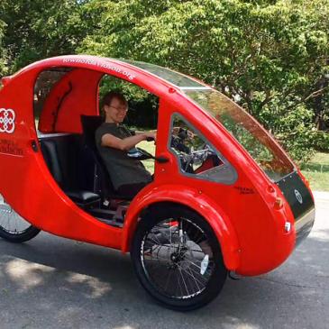 Charlene Minor of Davidson Parks & Rec in her ELF. (David Boraks/WFAE)