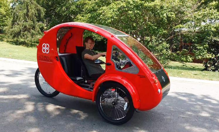 Charlene Minor of Davidson Parks & Rec in her ELF. (David Boraks/WFAE)