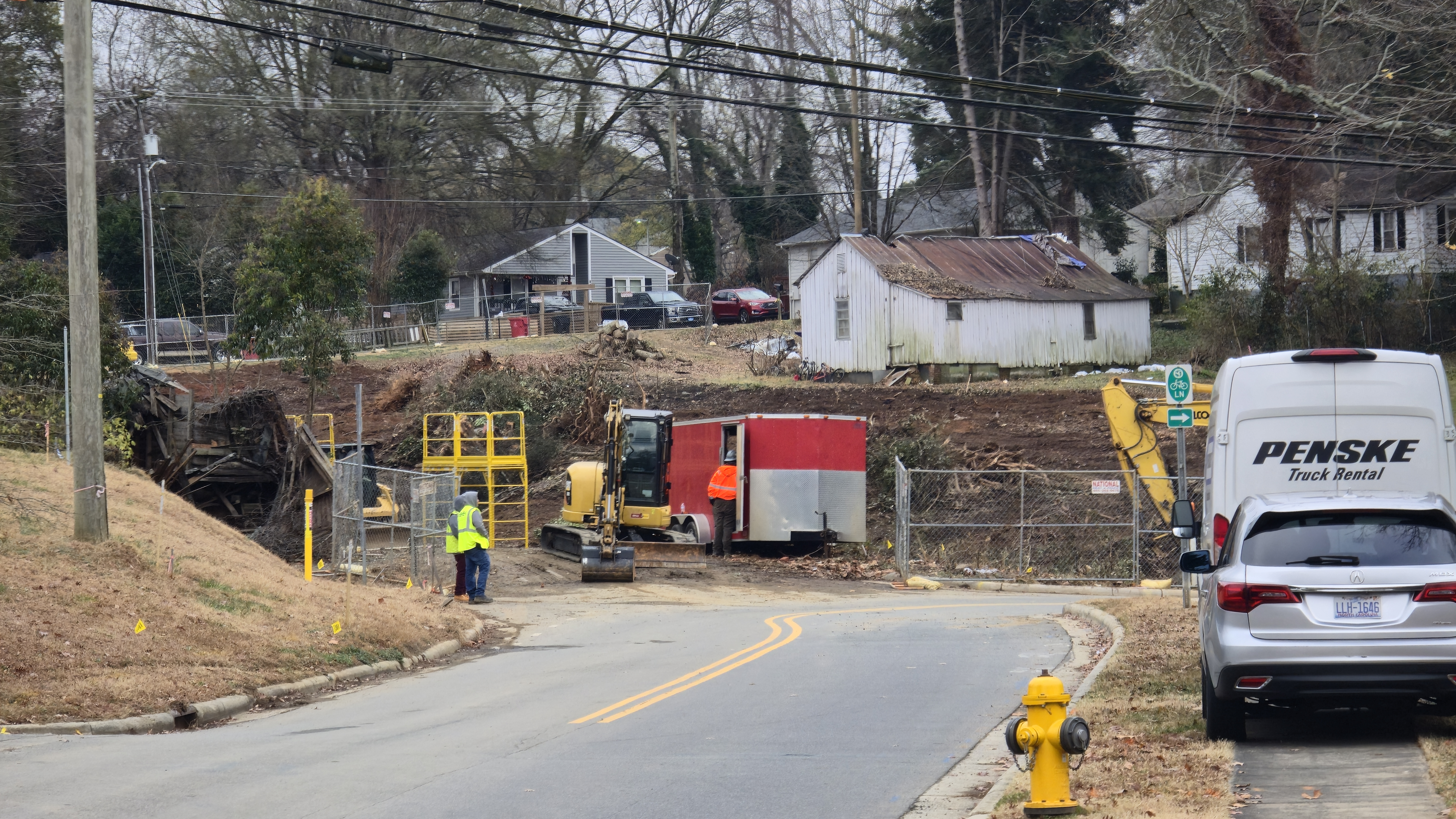 Workers have already cut trees and erected fencing around the land between Sloan Street (foreground) and Potts Street (top of photo)